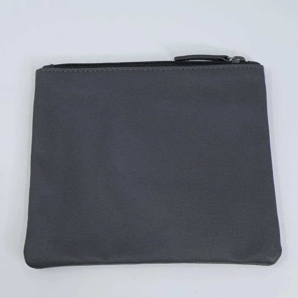 TUMI x DELTA Tumi Black‎ Toiletry Pouch Silver Logo Zip Closure Travel Accessory